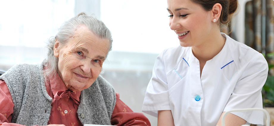 elderly woman and caregiver